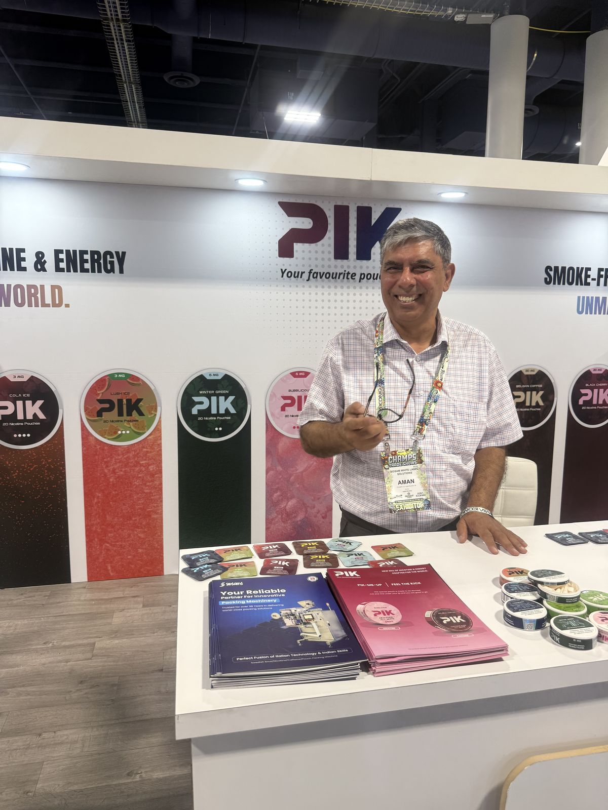 Aman Bhatia at the PIK Pouches booth, CHAMPS Las Vegas 2026