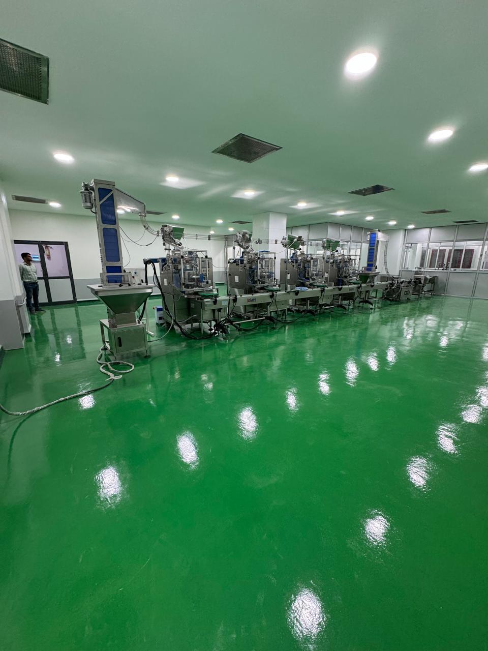 Automated nicotine pouch filling machinery production line
